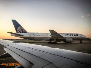 United 777 taxiing back prior to pushback
